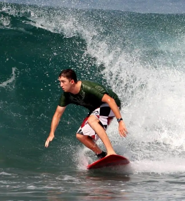 steve surfing on an epoxy surfboard in bali