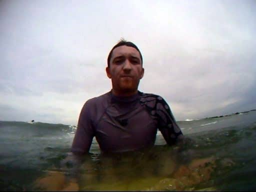 surfer looking at camera