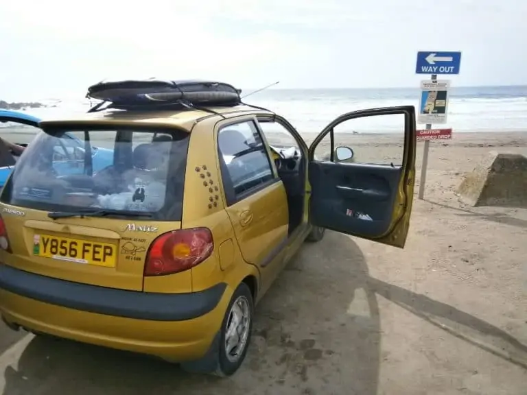 How to Carry a Surfboard on the Roof of Your Car: Full Guide