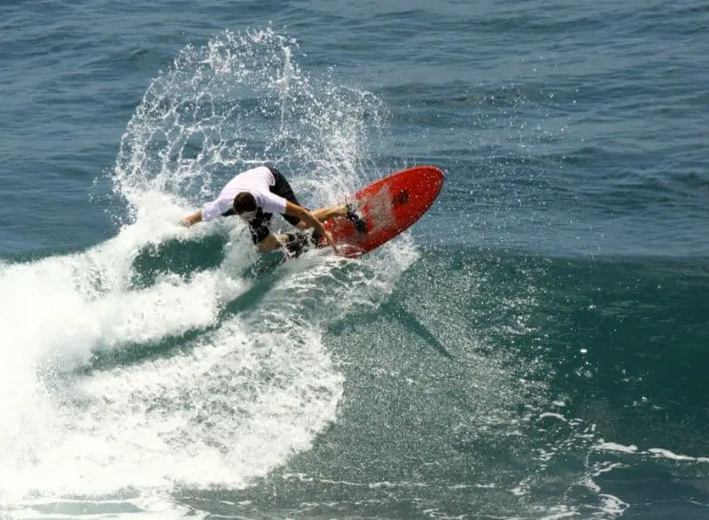 Me on my first day surfing at Uluwatu, trying to do a turn off the top.