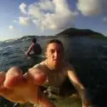 surfer reaching out to GoPro