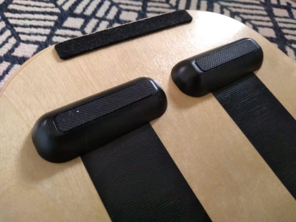 stoppers at the end of the under side of the balance board deck with felt end
